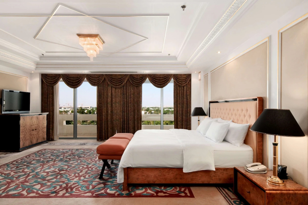 Presidential Double Suite with balcony and with pool view (full double bed)