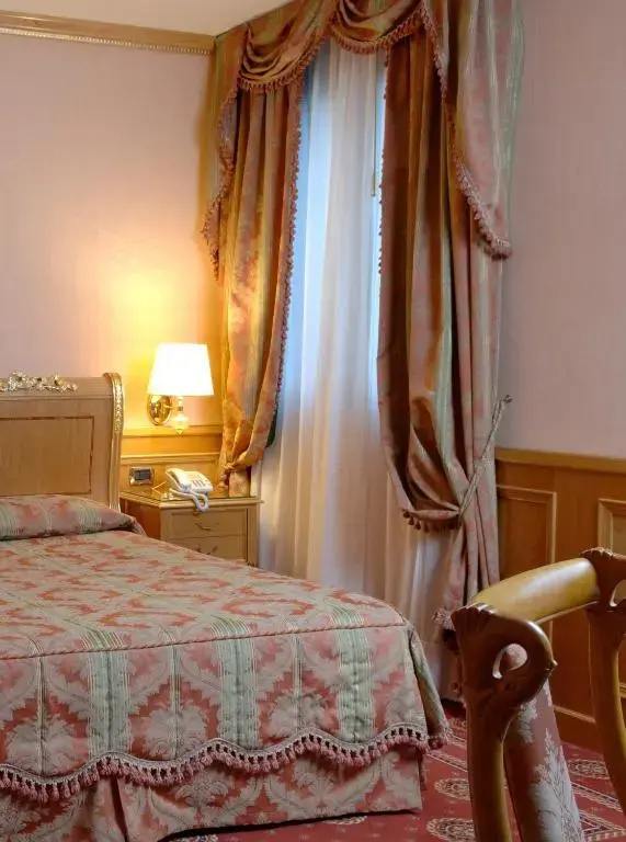 Andreola Central Hotel - Chambres