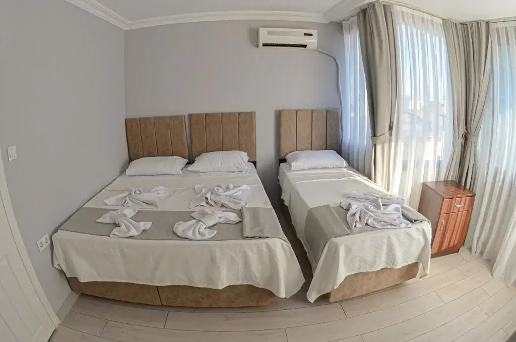 Standard Triple room with sea view