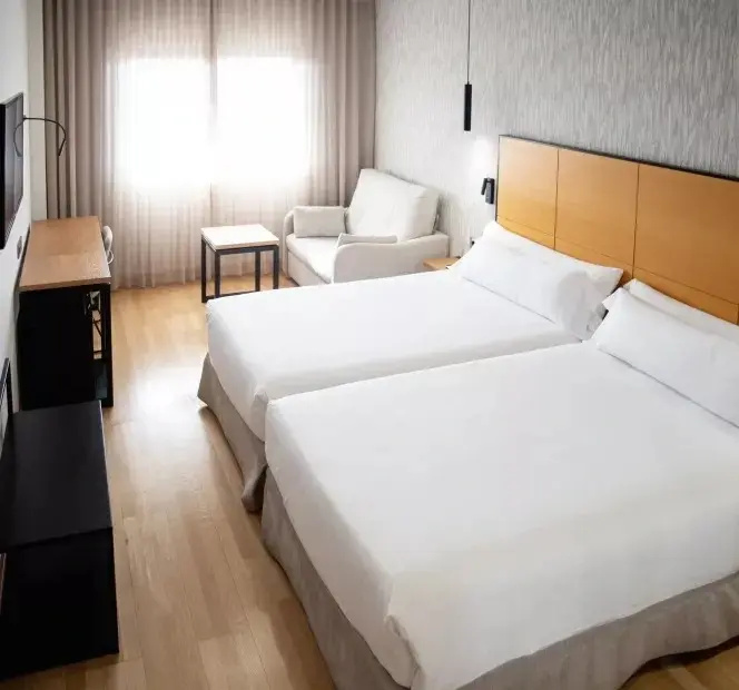 Hotel Sercotel Gran Fama - Chambres