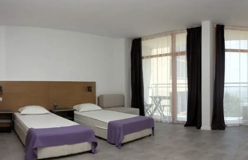 Sunrise Hotel - Chambres