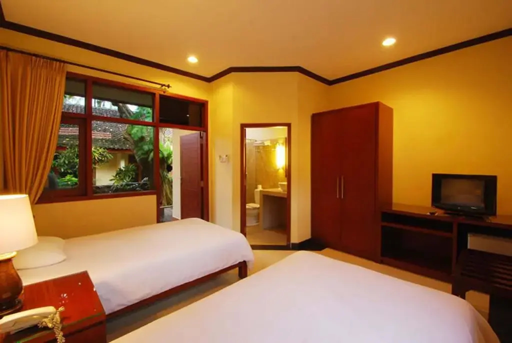 Yulia Beach Inn Kuta - Chambres