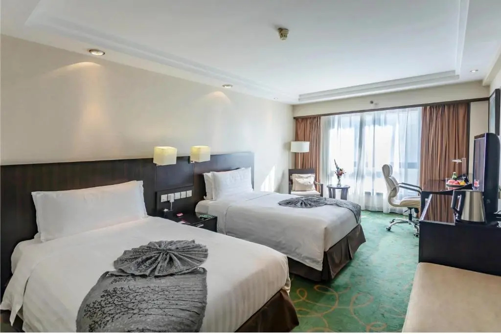 Guo Ji Yi Yuan Hotel - Chambres