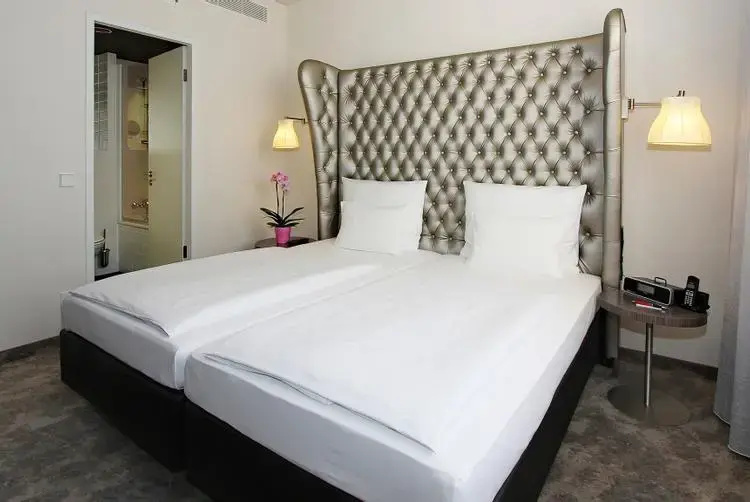 Arcotel John F Hotel  - Chambres
