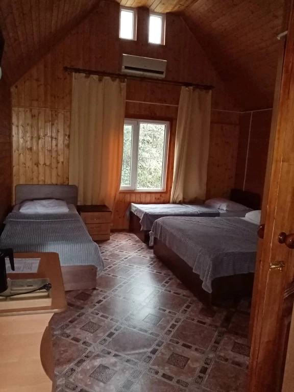 Четырёхместный домик с балконом в Гостевой дом