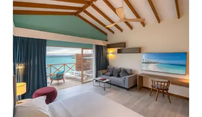 Lagoon Double Suite, bed type is subject to availability, speedboat transfer included, full double bed room photo 1
