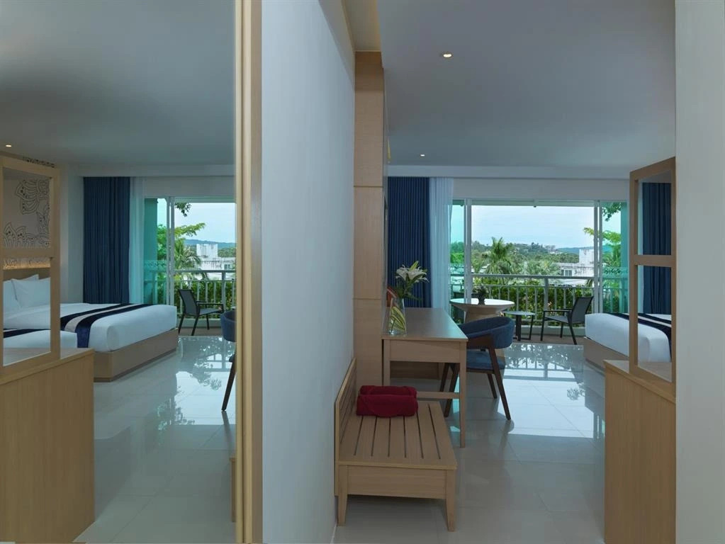 Четырёхместный номер Grand Deluxe в Chanalai Flora Resort, Kata Beach