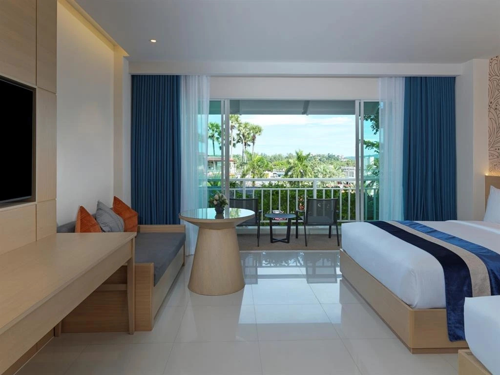 Четырёхместный номер Grand Deluxe в Chanalai Flora Resort, Kata Beach