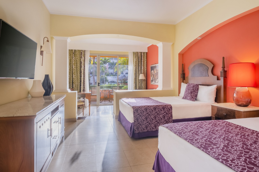 Quadruple Junior Suite with garden view