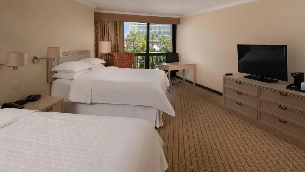 Larger Quadruple room with partial ocean view