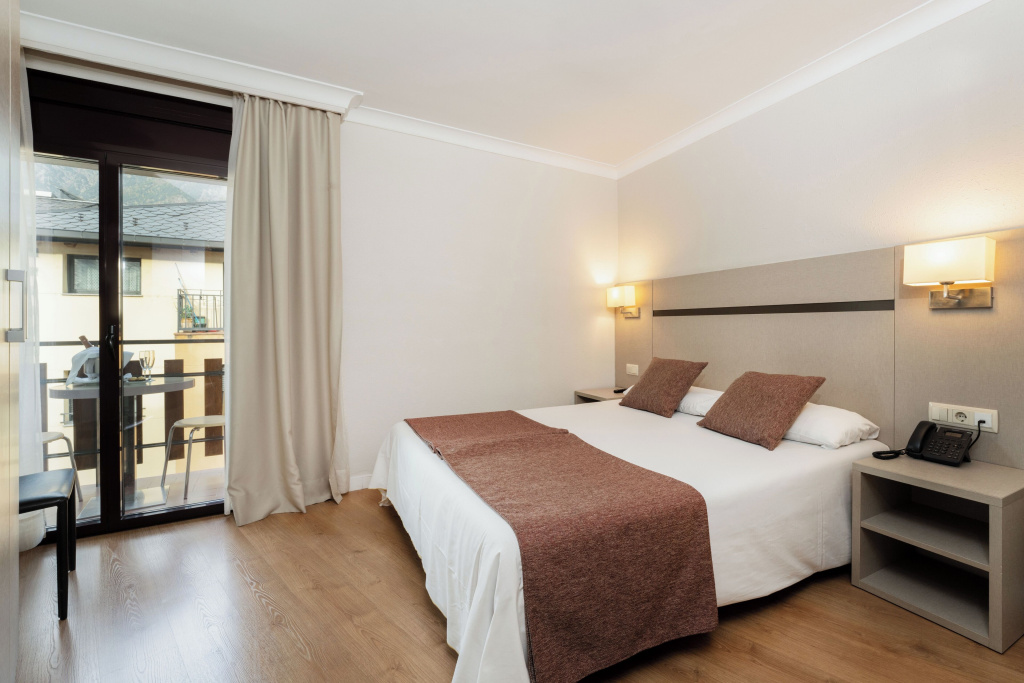 Hotel & Aparthotel Cosmos - Chambres