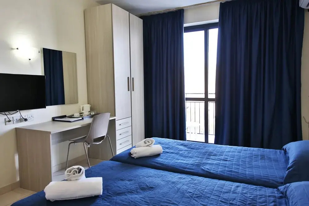 Relax Inn Hotel - Chambres