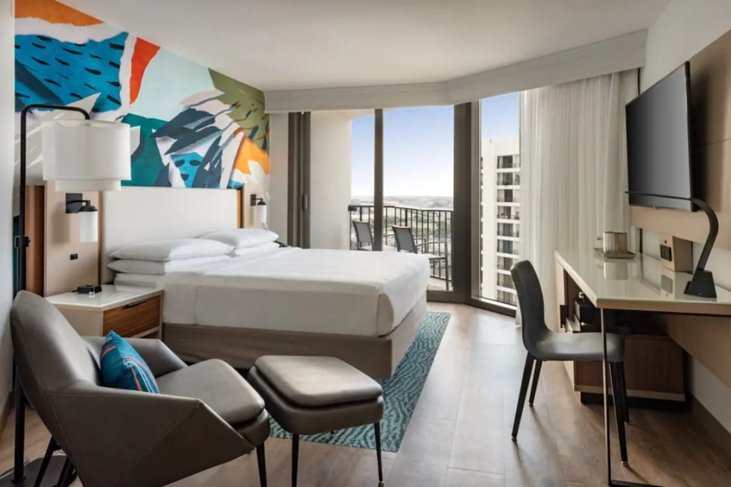 Room with balcony and with city view