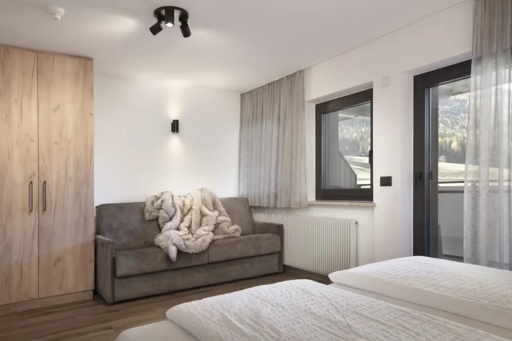Aparthotel Familiaris - Family Apartments - Pools & Spa in the Dolomites - Chambres