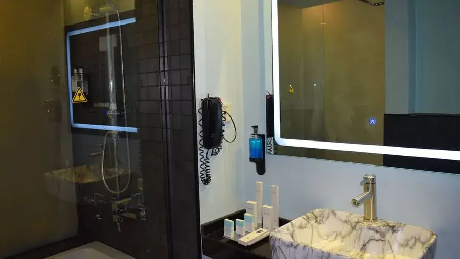 Signature Hotel Apartments & Spa - Chambres