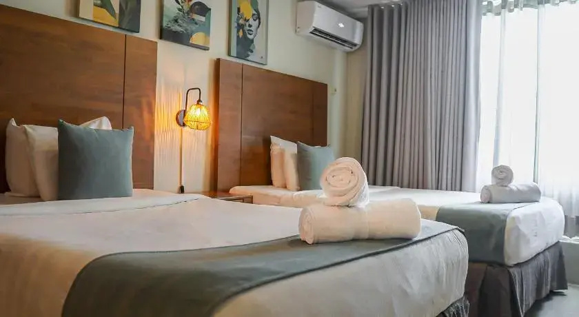 Majestic City Suites & Beach Hotel - Chambres