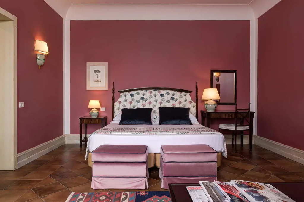 Double Junior Suite with balcony and with Pool and Crenellated Tower View (full double bed)
