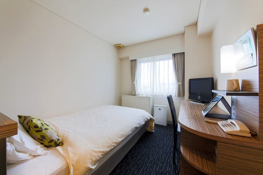 Plaza Hotel Toyota - Chambres
