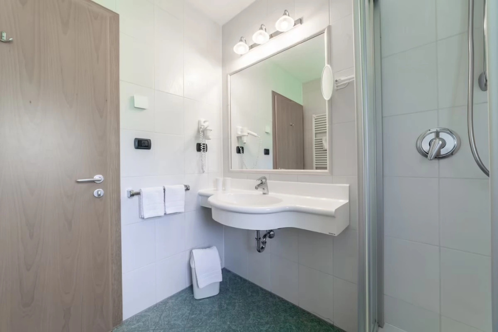 Aparthotel Familiaris - Family Apartments - Pools & Spa in the Dolomites - Chambres