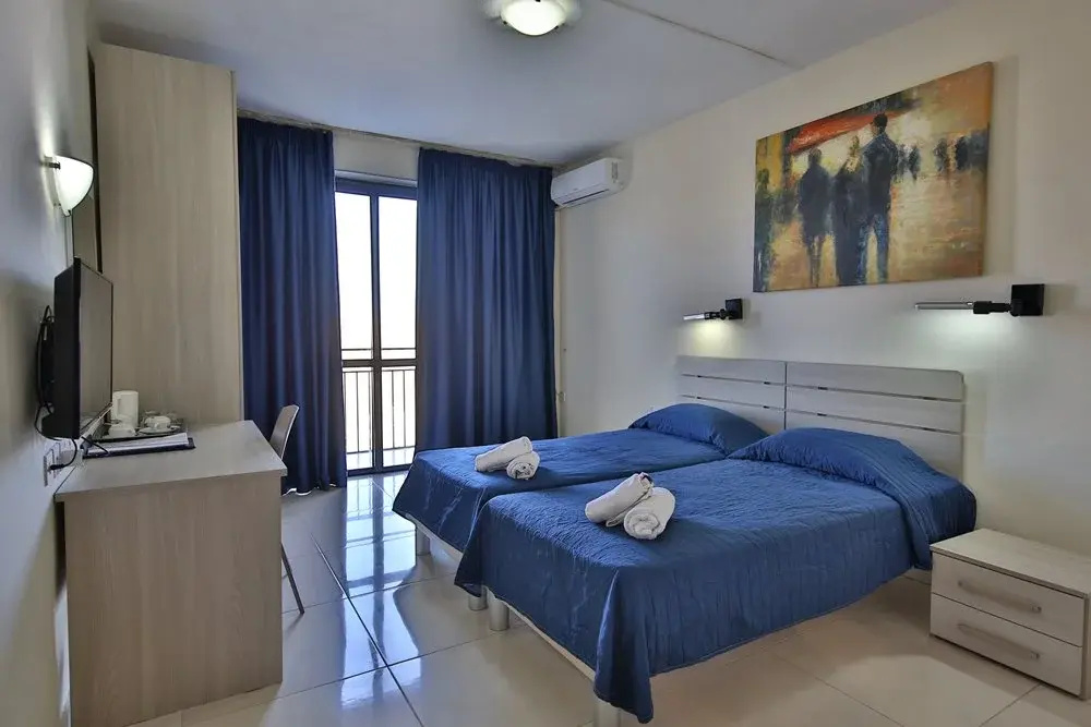 Relax Inn Hotel - Chambres