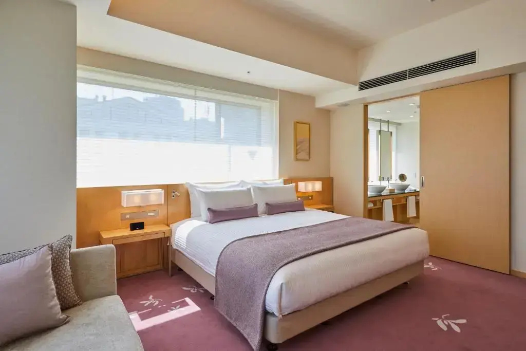 Kitano Signature Spring Double Suite full double bed
