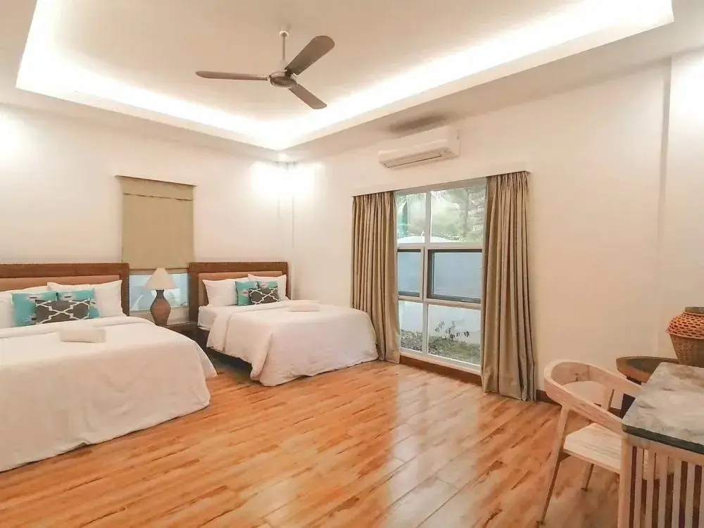 Vida Homes Condo Resort - Chambres