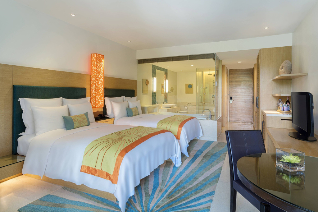 Quadruple room with balcony and with lagoon view