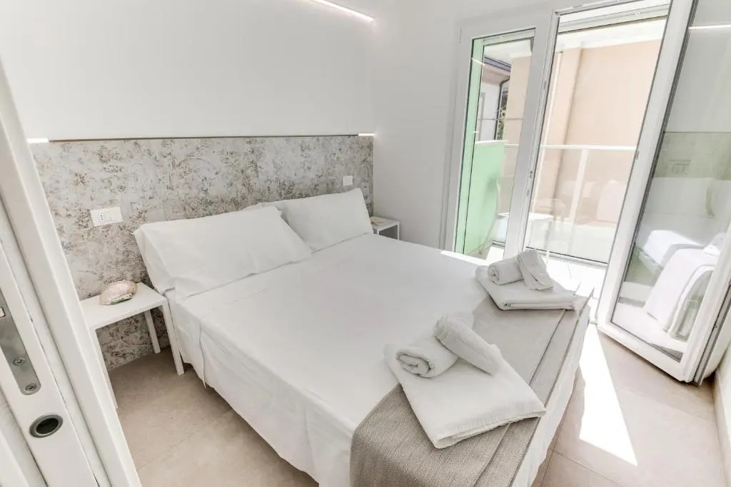 Residence Diffuso Arcobaleno - Chambres