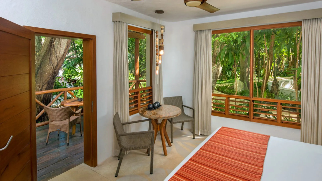 Двухместный люкс Oasis двуспальная кровать в Shangri-la Caribe Beach Village Resort