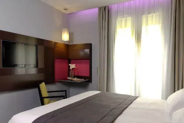 Двухместный номер двуспальная кровать в Hotel Lumières Montmartre Paris