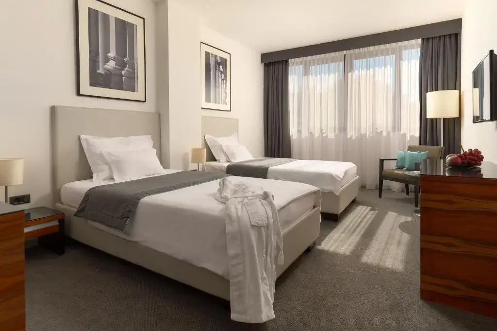 Atrium Hotel - Chambres