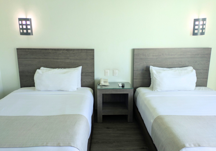 We Hotel Aeropuerto - Chambres