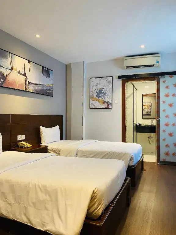 Central Park Saigon Hotel - Chambres