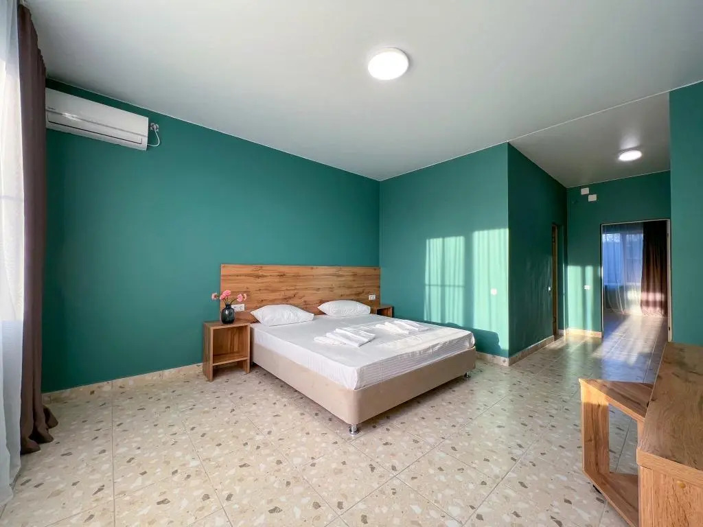 Четырёхместный номер Стандарт (корпус С) с 2 комнатами с видом на парк в Напра