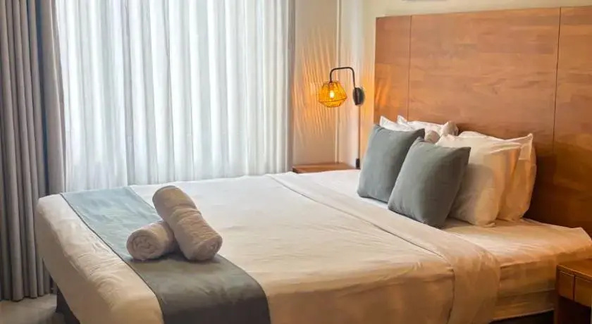 Majestic City Suites & Beach Hotel - Chambres