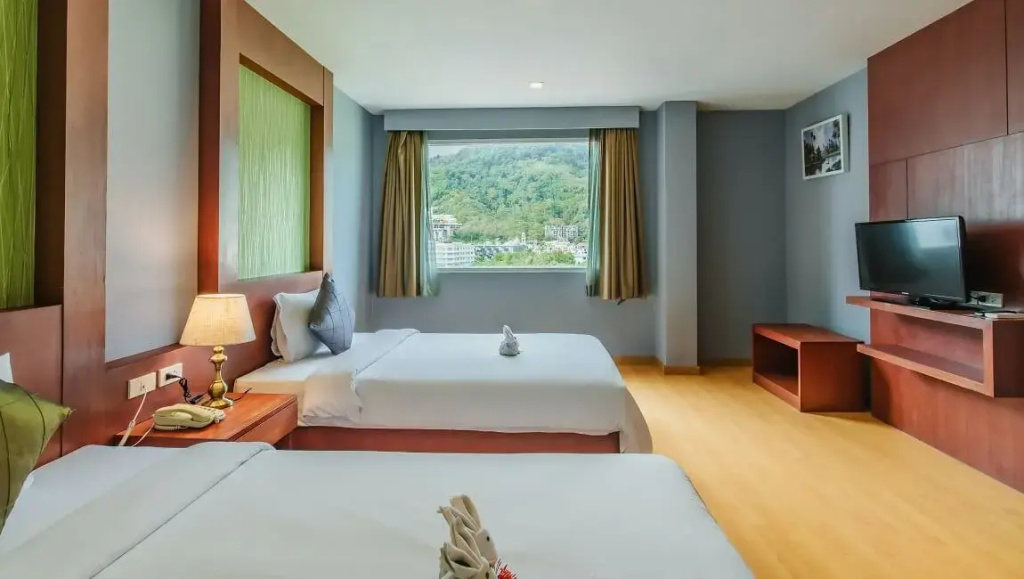 Elite Suites Patong Hotel - Chambres