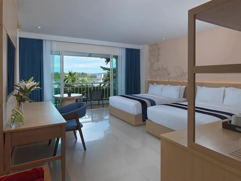 Четырёхместный номер Grand Deluxe в Chanalai Flora Resort, Kata Beach