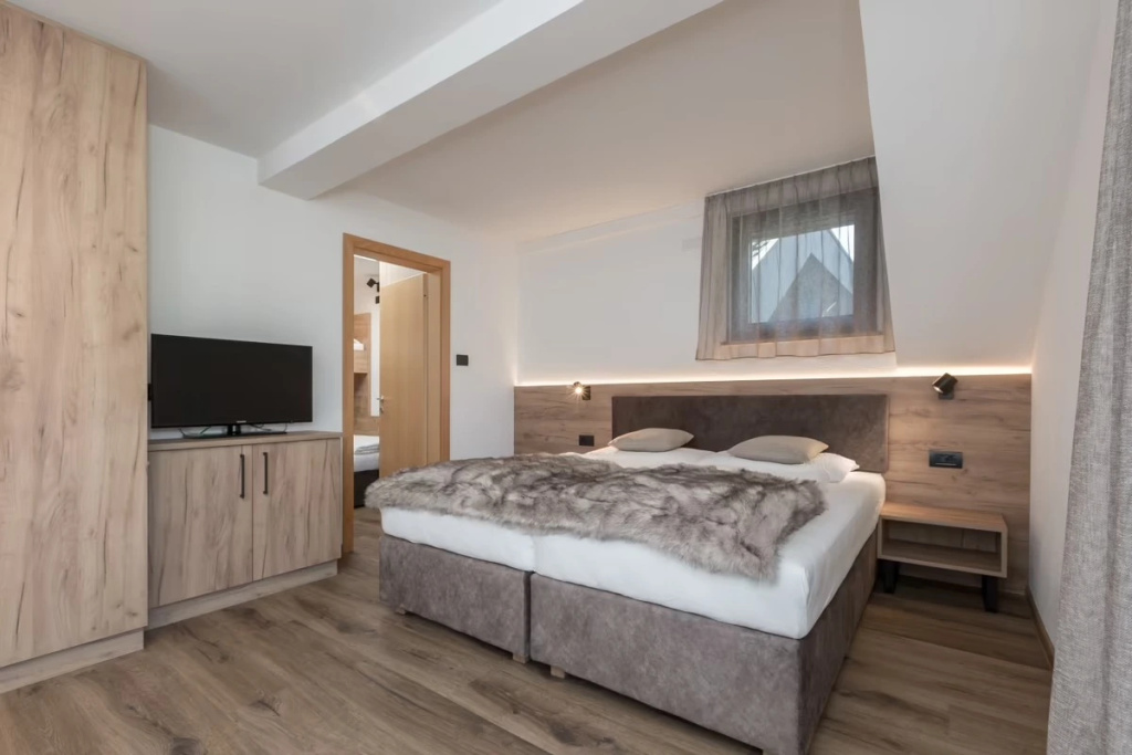 Aparthotel Familiaris - Family Apartments - Pools & Spa in the Dolomites - Chambres
