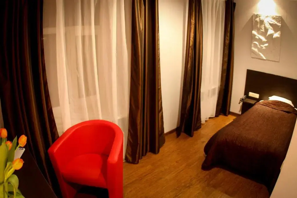 Primo Hotel - Chambres