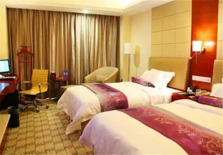 Huatian Hotel - Chambres