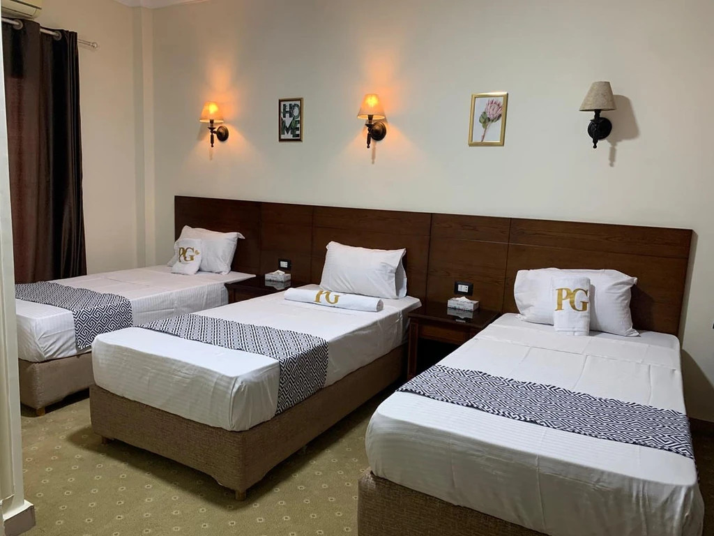 Четырёхместный семейный люкс Deluxe в Montana Hotel