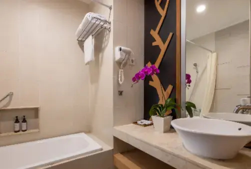 Adhi Jaya Hotel - Chambres