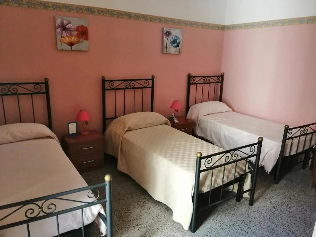 Standard Triple room with balcony and with courtyard view