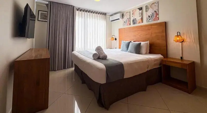 Majestic City Suites & Beach Hotel - Chambres