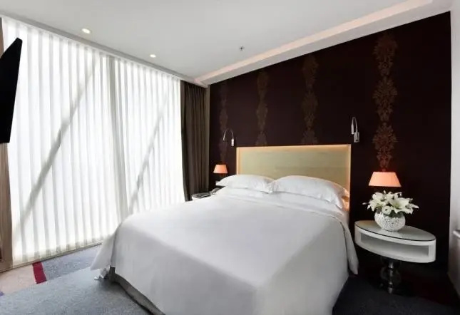 Burgu Arjaan by Rotana Hotel - Chambres