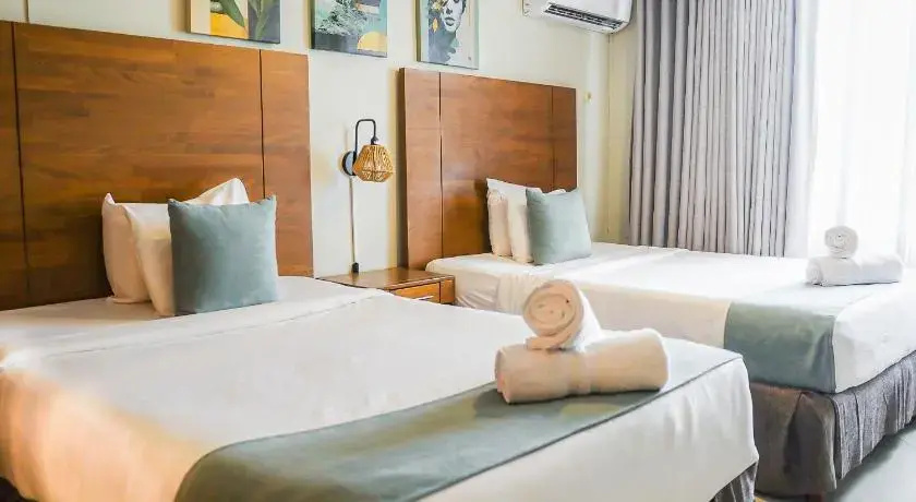 Majestic City Suites & Beach Hotel - Chambres