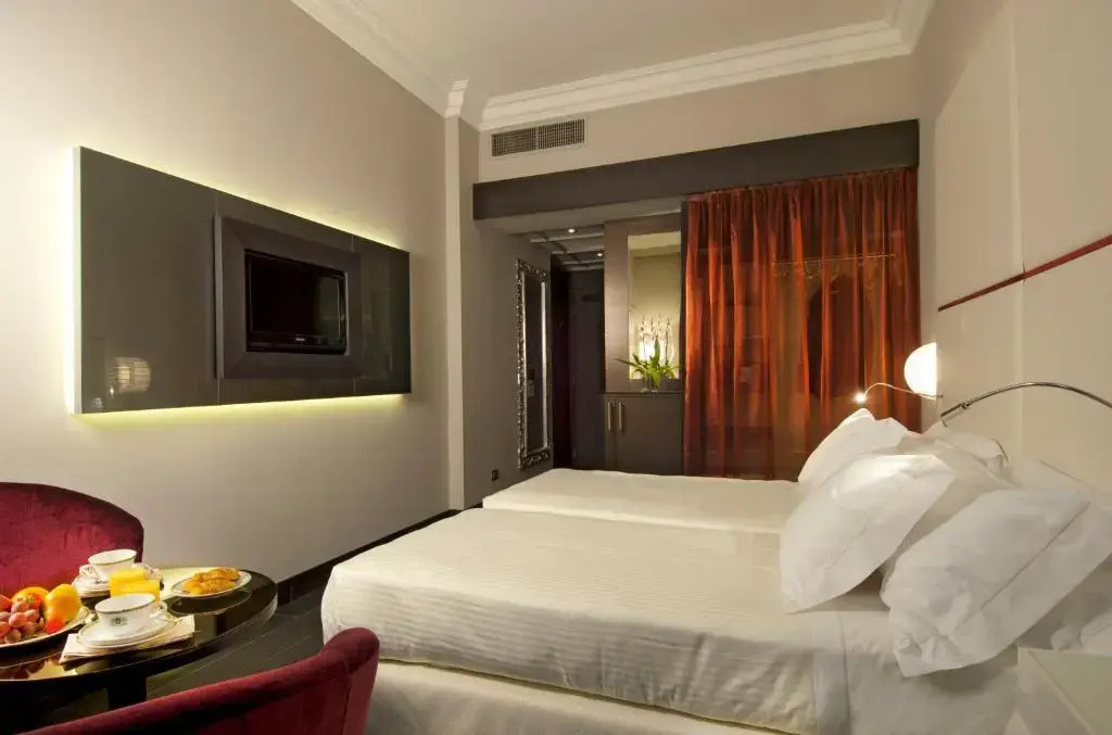 Sina De la Ville Hotel - Chambres