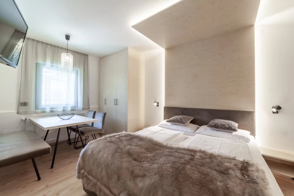 Aparthotel Familiaris - Family Apartments - Pools & Spa in the Dolomites - Chambres
