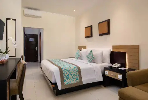 Adhi Jaya Hotel - Chambres