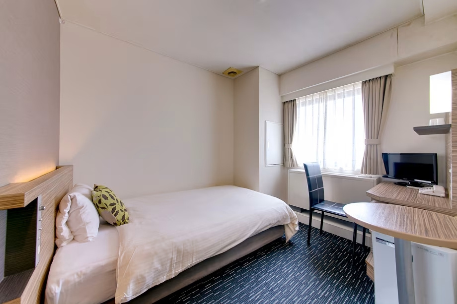 Plaza Hotel Toyota - Chambres